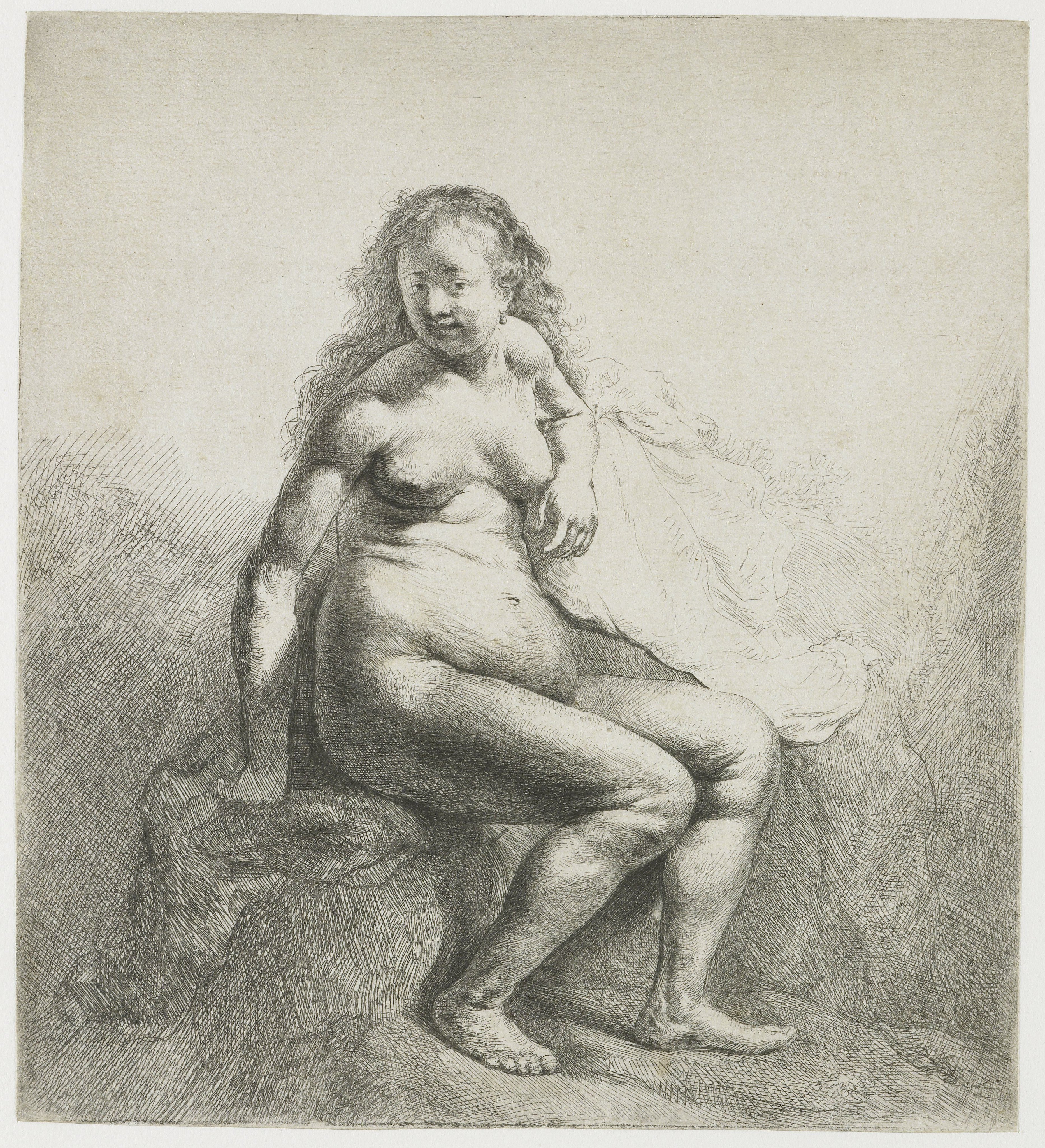 Naked woman on a mound