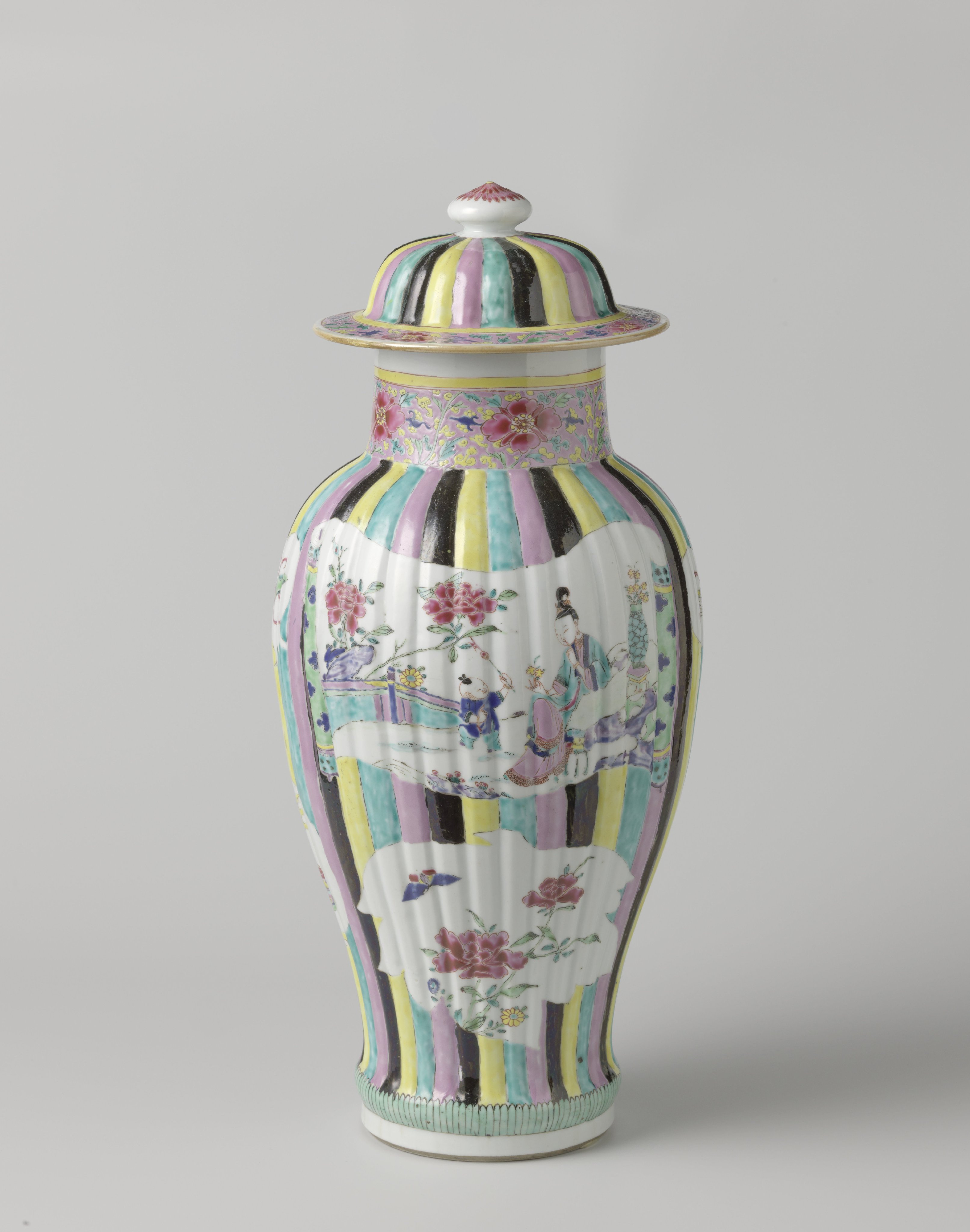Covered jar with figures, flower sprays and auspicious symbols in shaped panels on a multi-colored ground