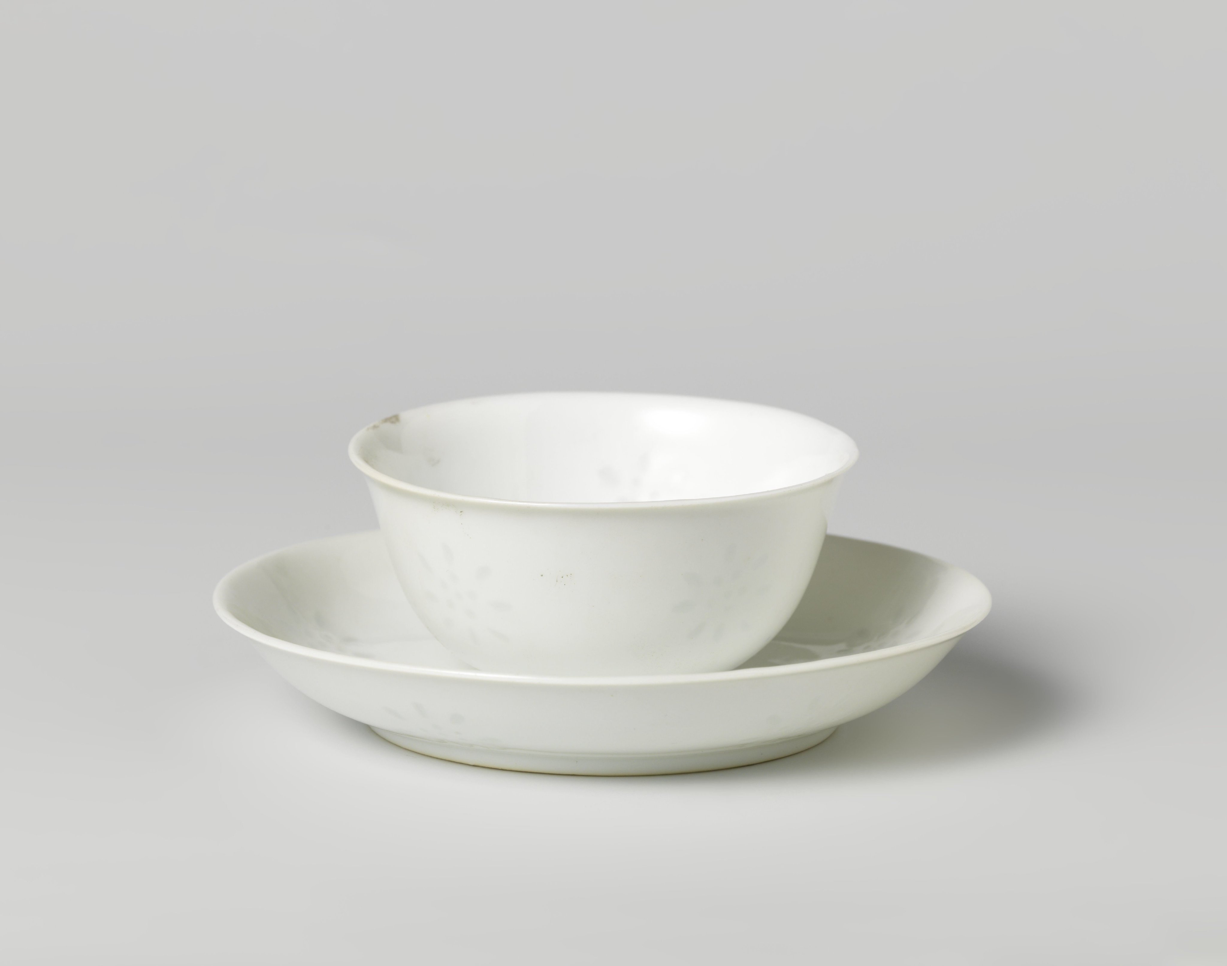 Cup and saucer with translucents rice-grain roundels