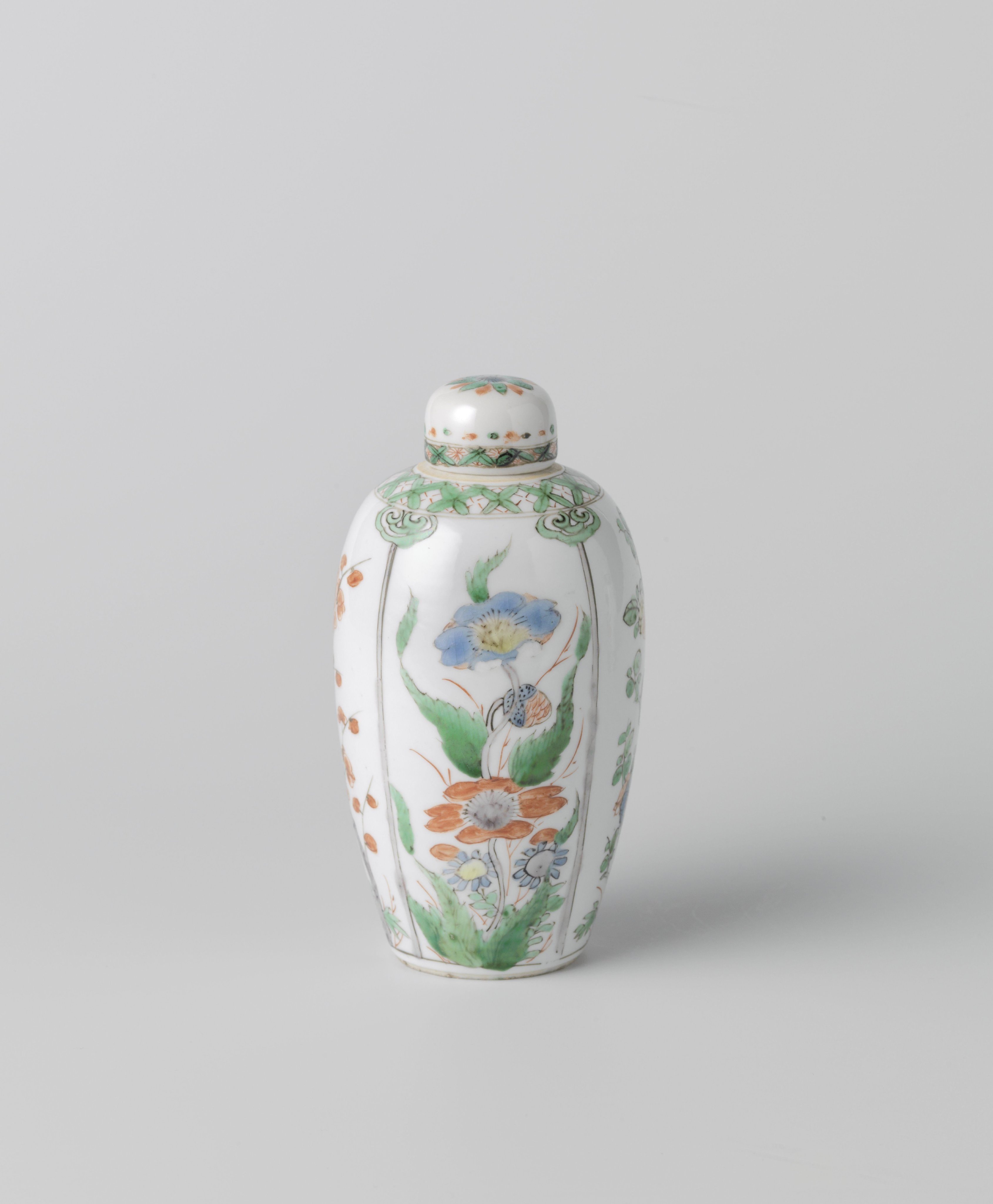 Ovoid covered jar with flowering plants in panels
