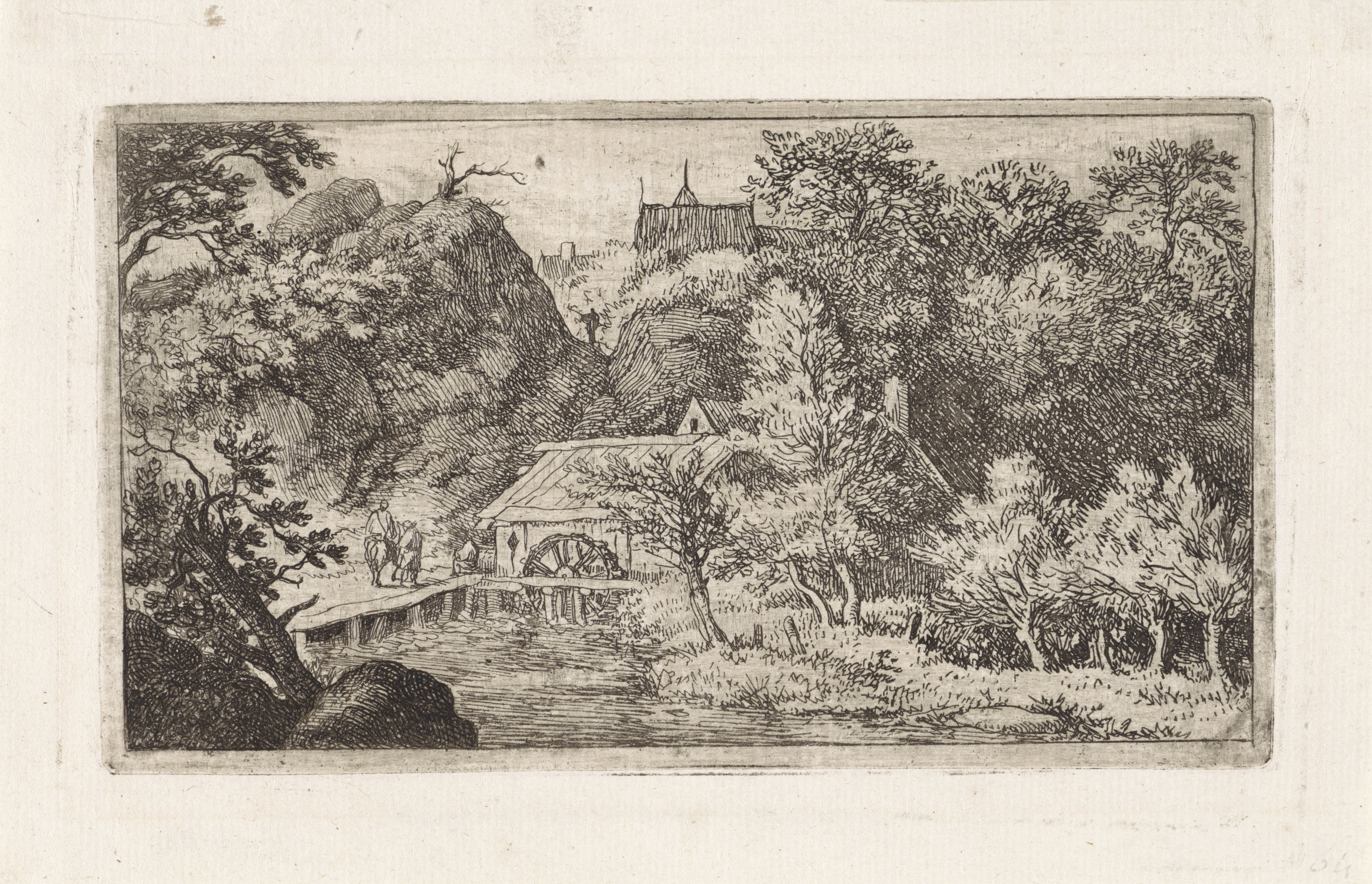 Watermolen aan de voet van een berg