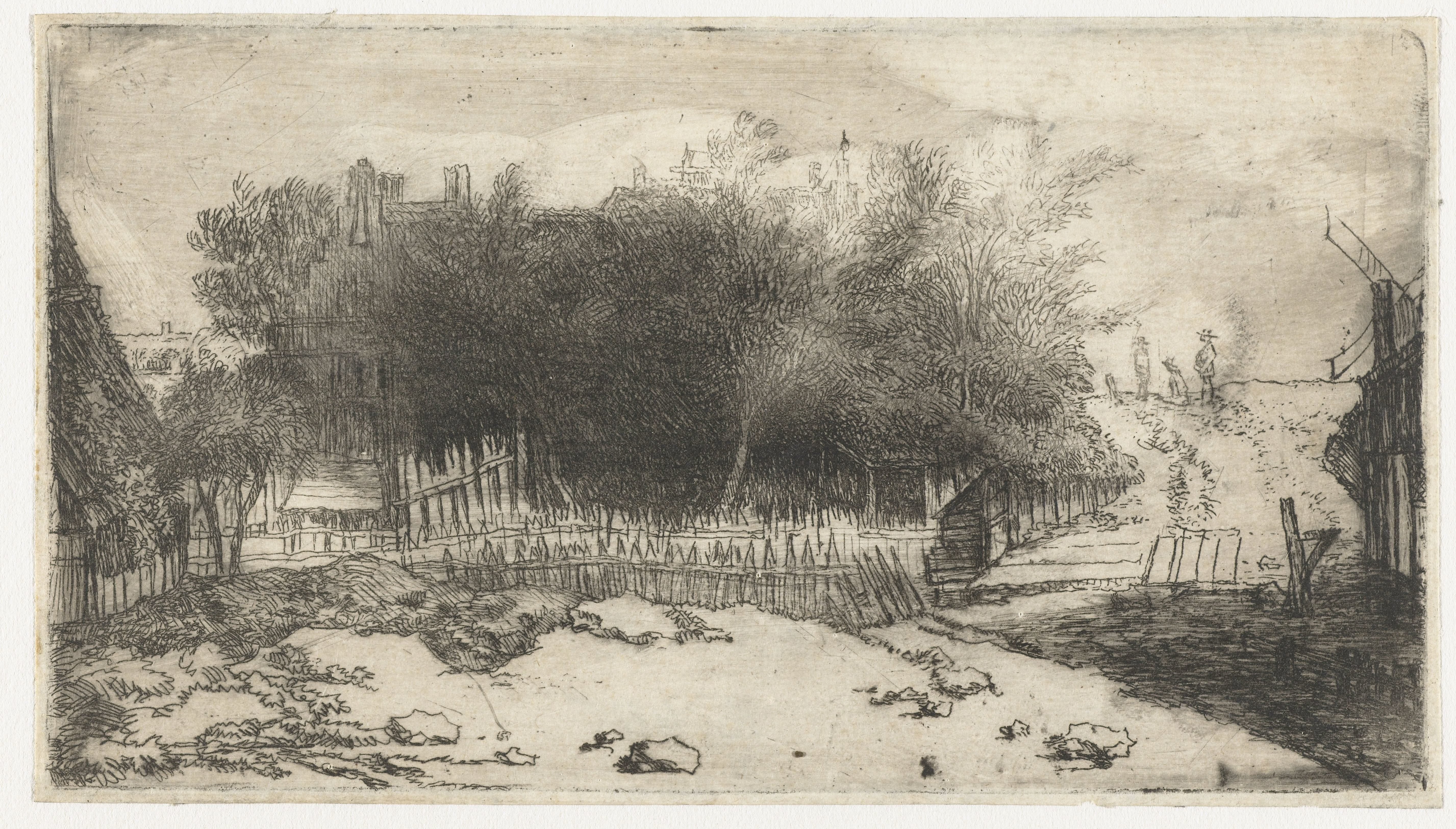 Landschap met een wit hek