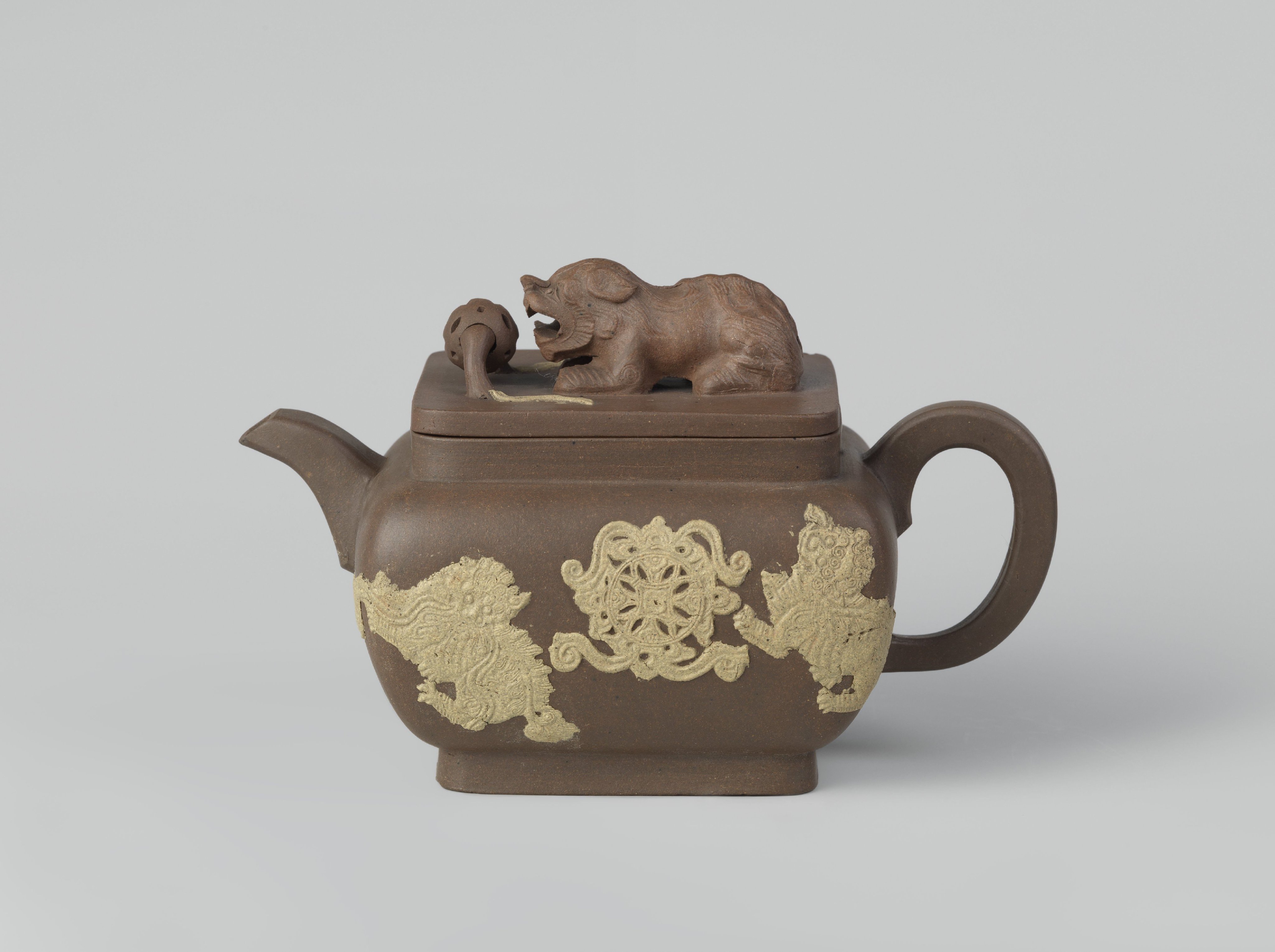 Square teapot with shishi in relief