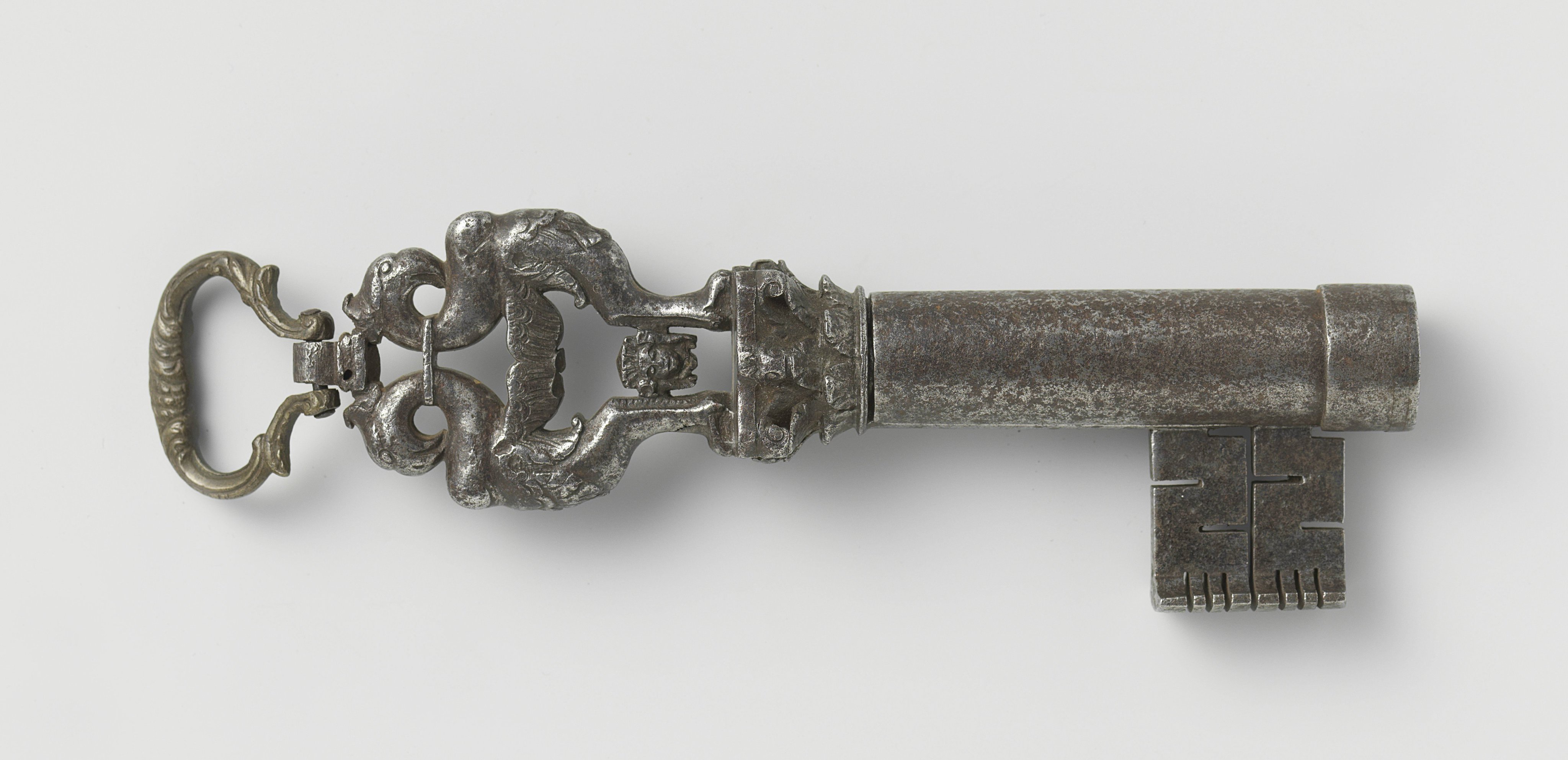 Key with hinged handle