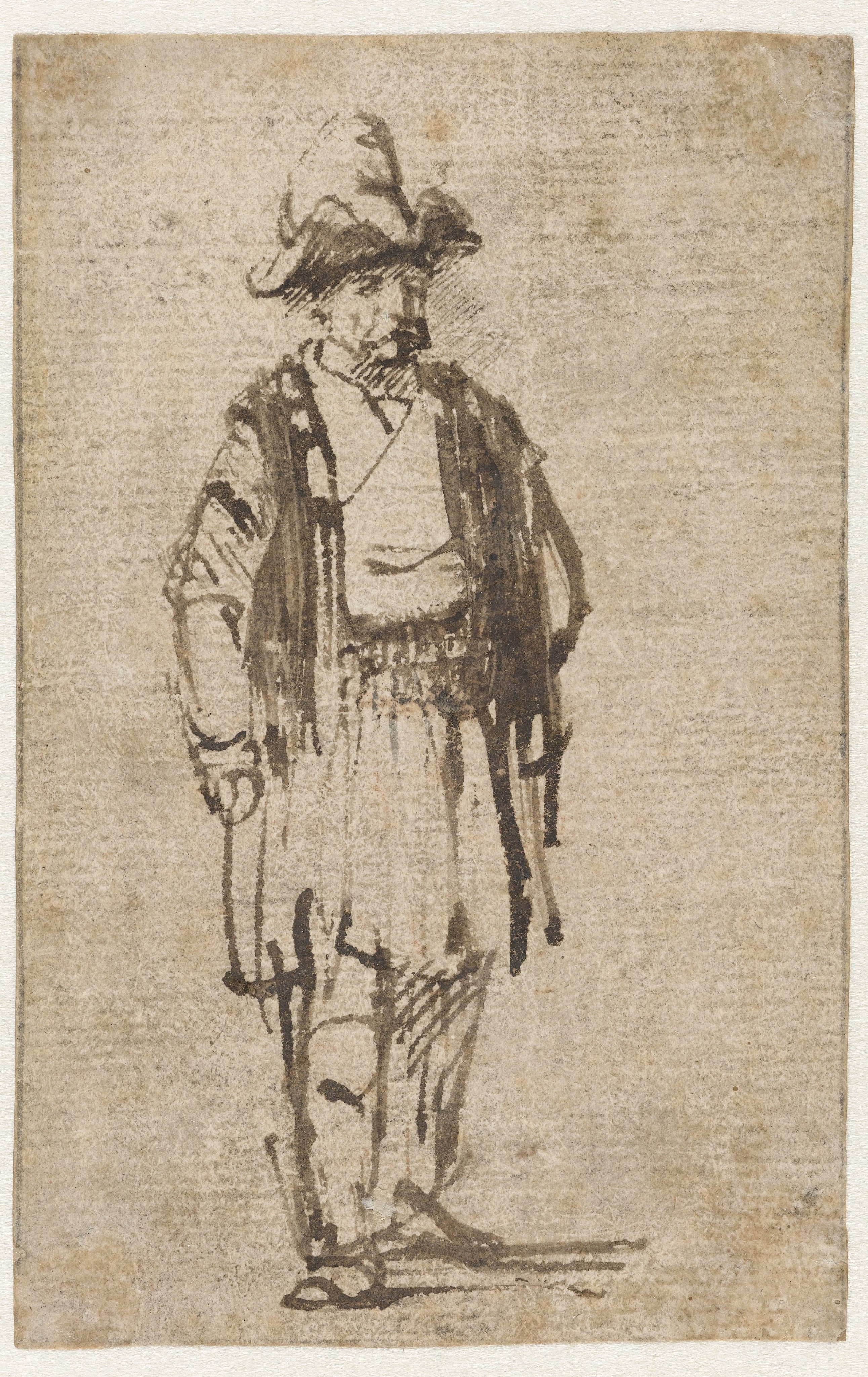 Standing Man Wearing a Hat and a Short Coat