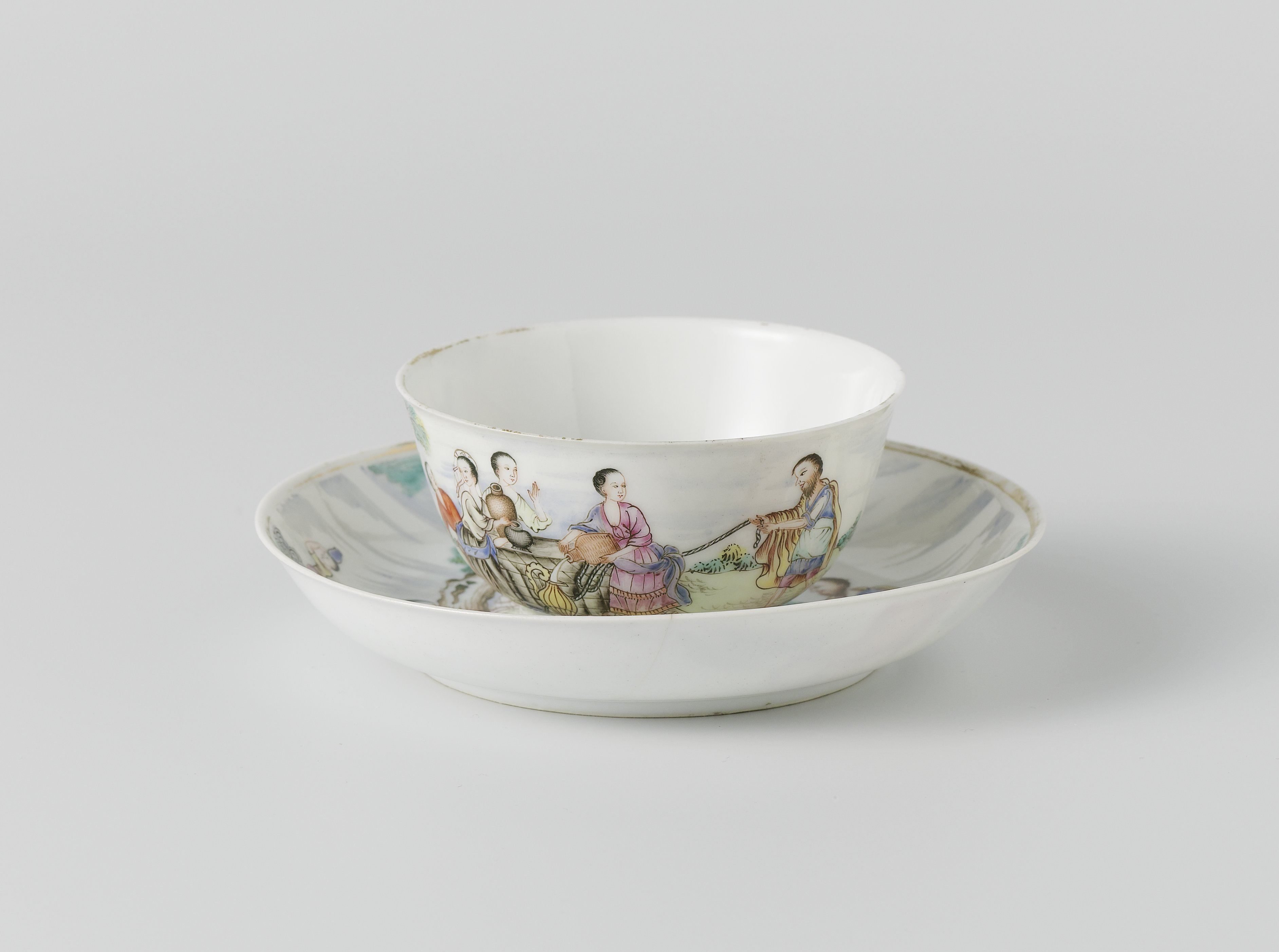 Bell-shaped cup and saucer with an image of Rebecca at the Well