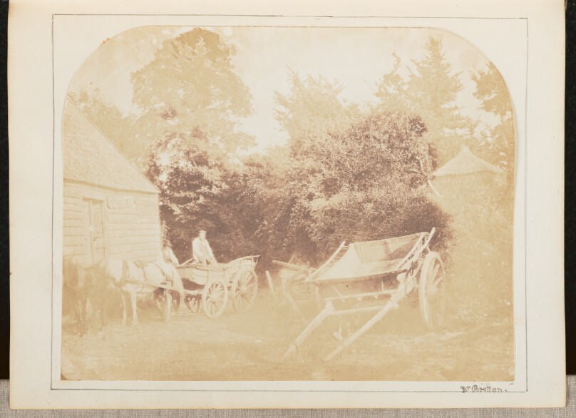 [Men Sitting in Carriage]