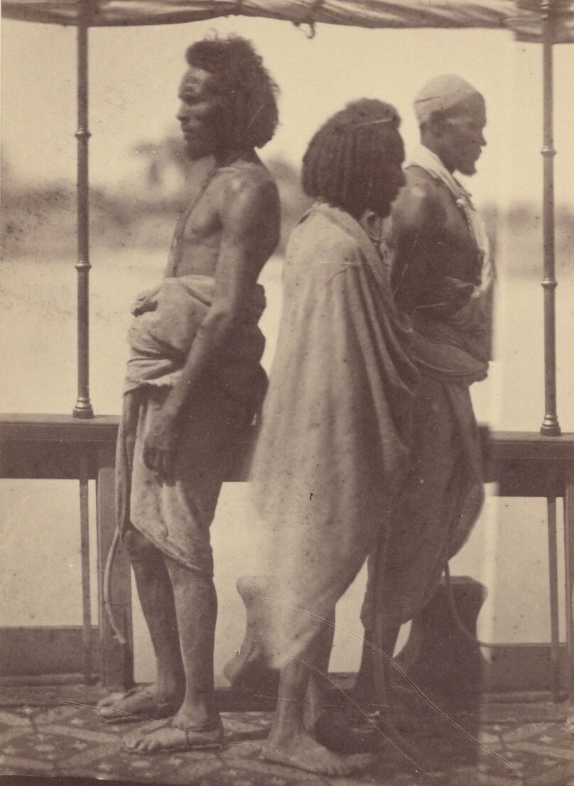 [Portrait of Three Native Men Standing in Profile]