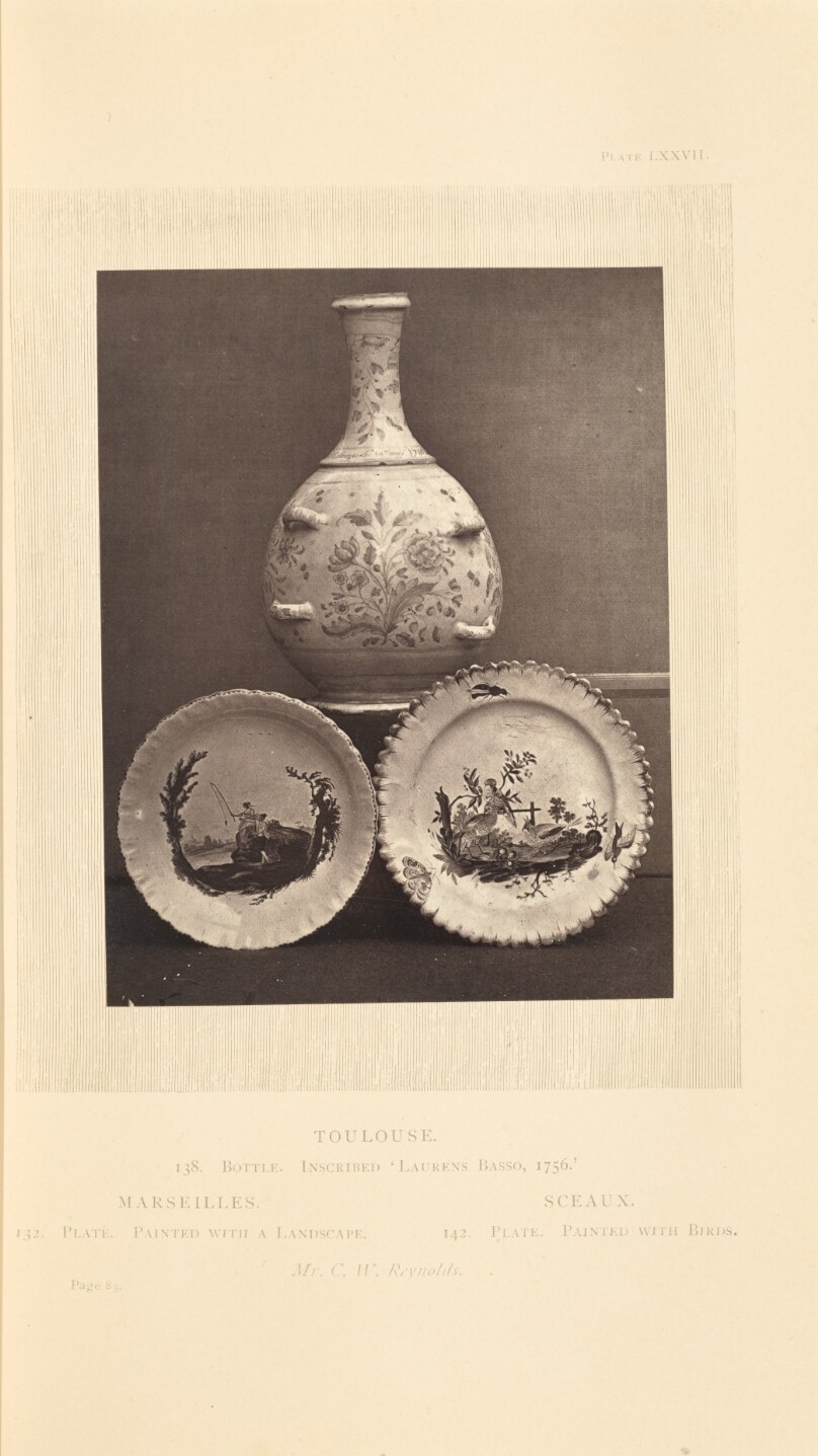 [Bottle and two plates]