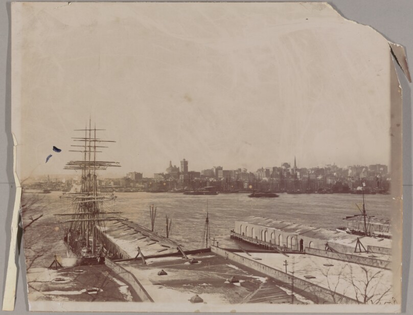 [City seen across water]