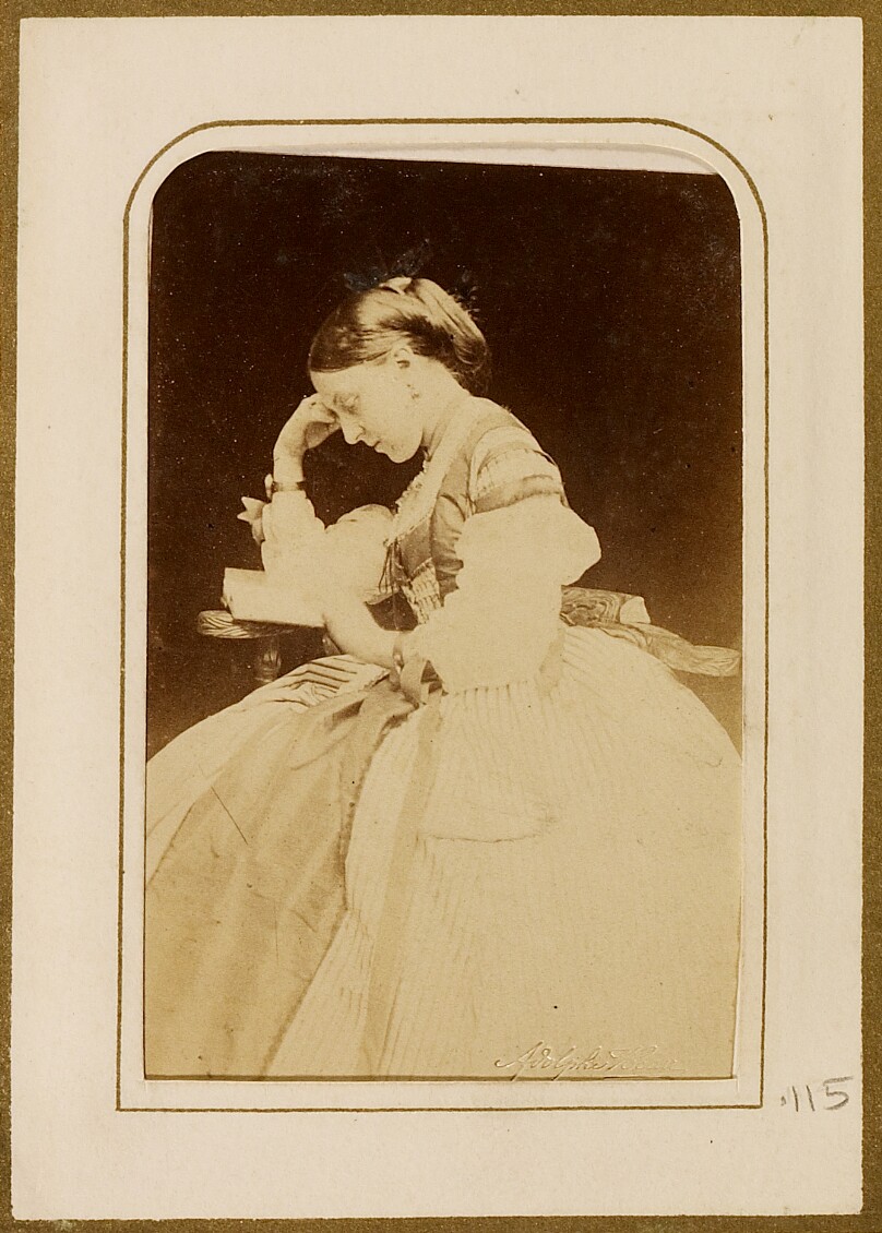 [Portrait of woman reading a book]