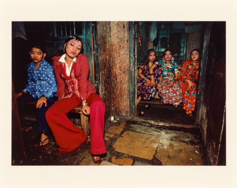 Seated Nepalese girls waiting for customers, Falkland Road, Bombay, India