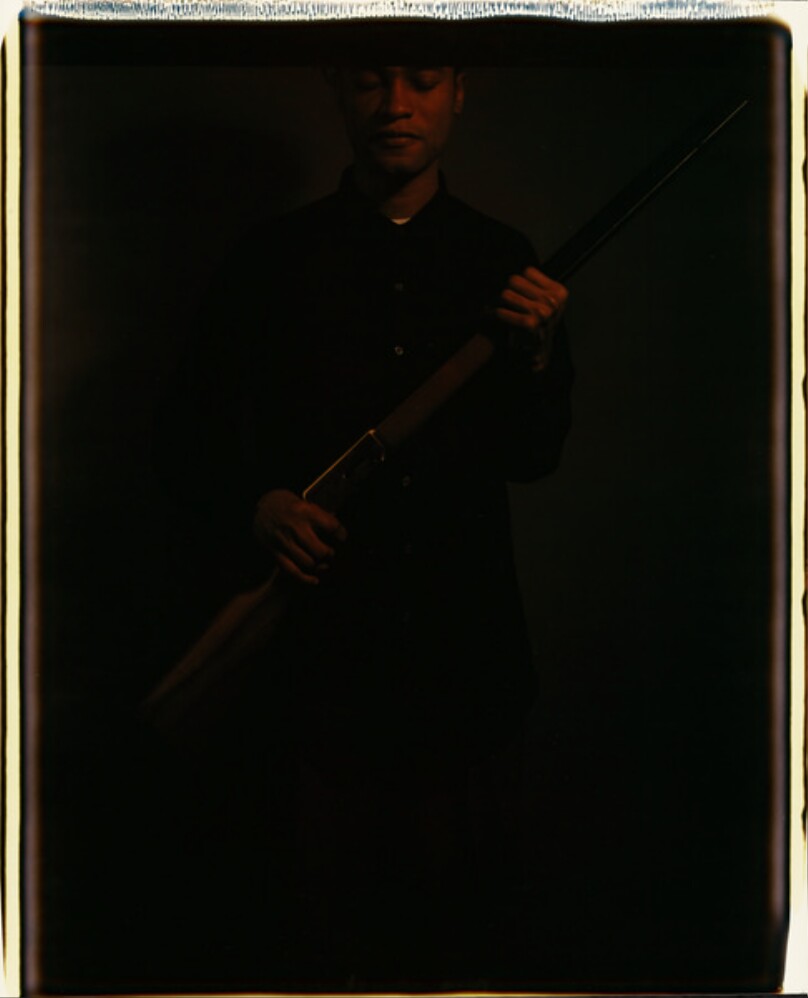 An Armed Man; A Veiled Woman