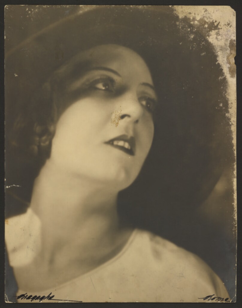 [Portrait of woman in hat]