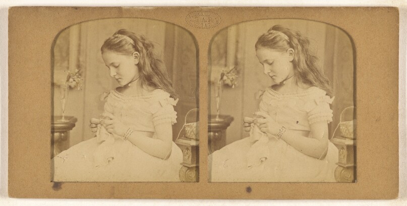 [Little girl sewing]