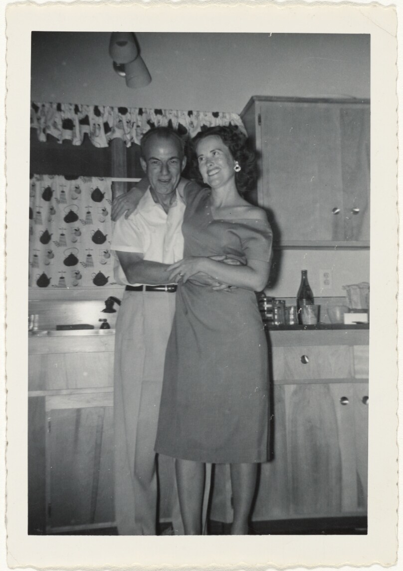[Man and woman in kitchen]