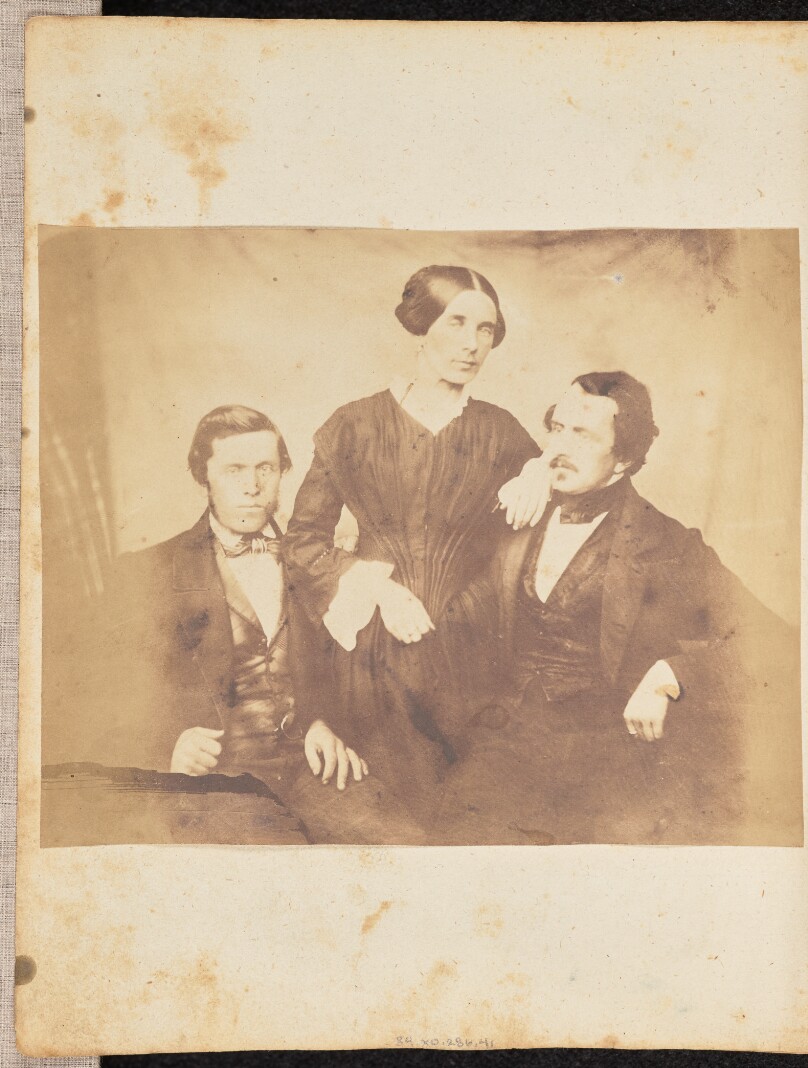 [Portrait of a woman and two men]