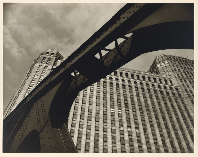 Steel and Stone. The Merchandise Mart, the city within a city, seen from Franklin Street Bridge.