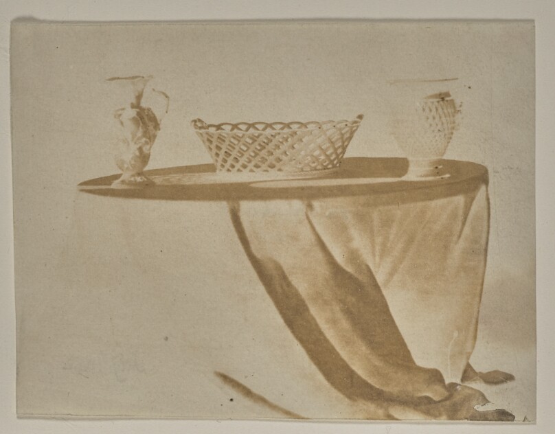 [Three Pieces of Dresden China on a Round Table]