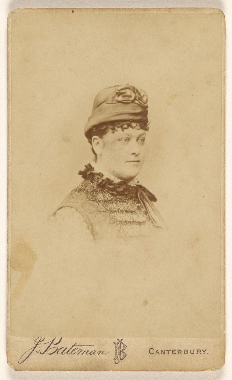 [Unidentified woman wearing period hat, in vignette-style]