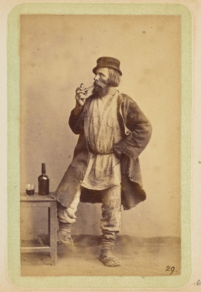 [Bearded man smoking a pipe]