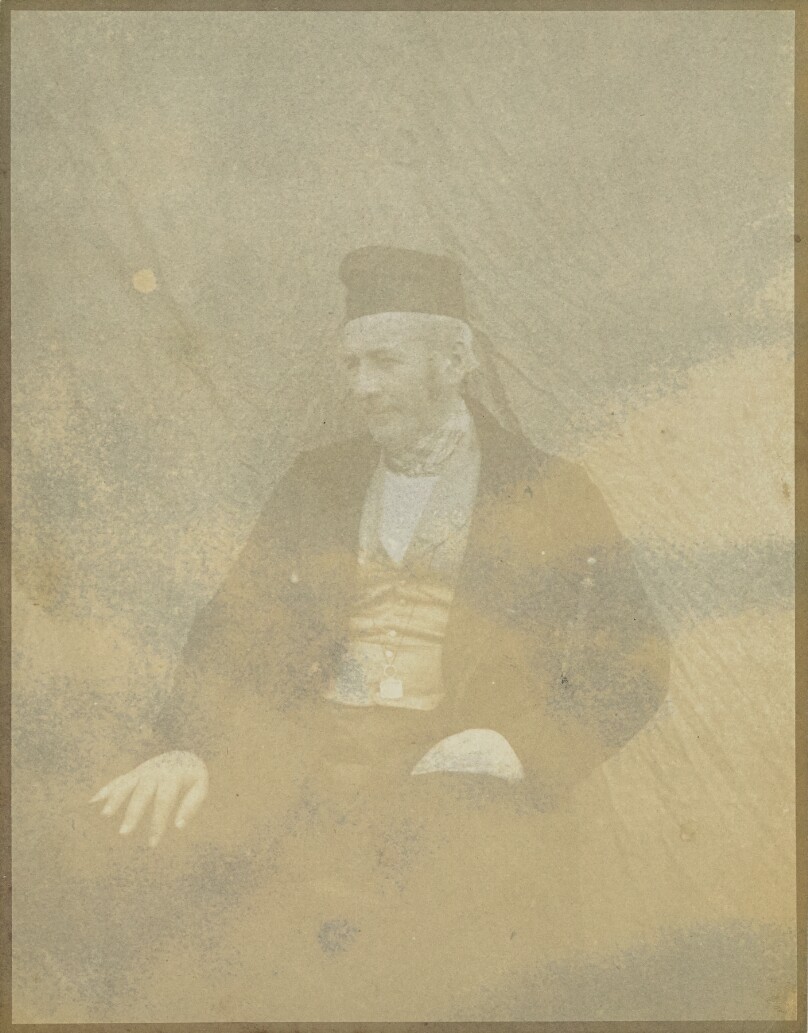 [Portrait of a Seated Man in a Cap]
