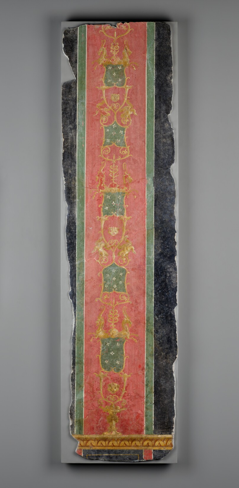 Wall Fragment with Red Stripe which carries Vines and Flowers set against Black Ground
