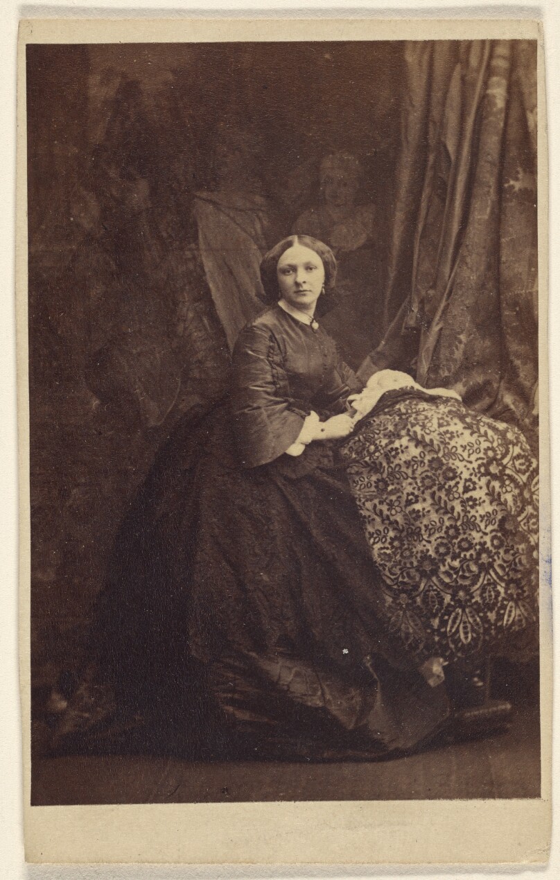 [Unidentified woman, seated]