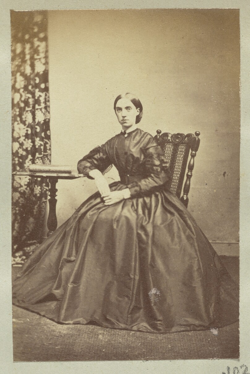 [Portrait of sitting woman]