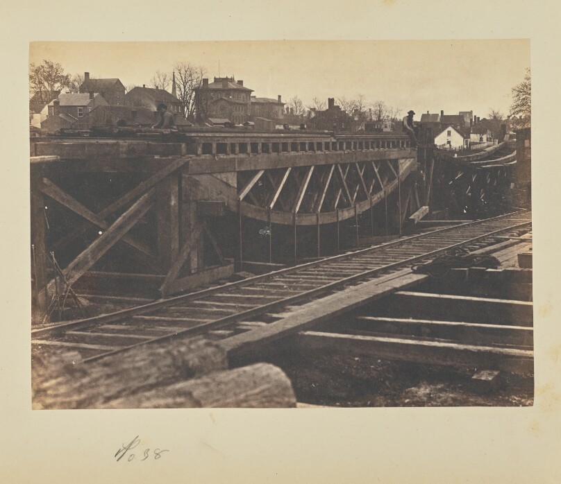Bridge of Board Trusses Being Tested for Deflections