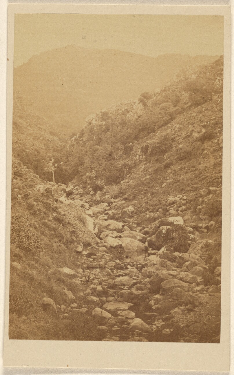[View of an unidentified rocky mountains and valley]