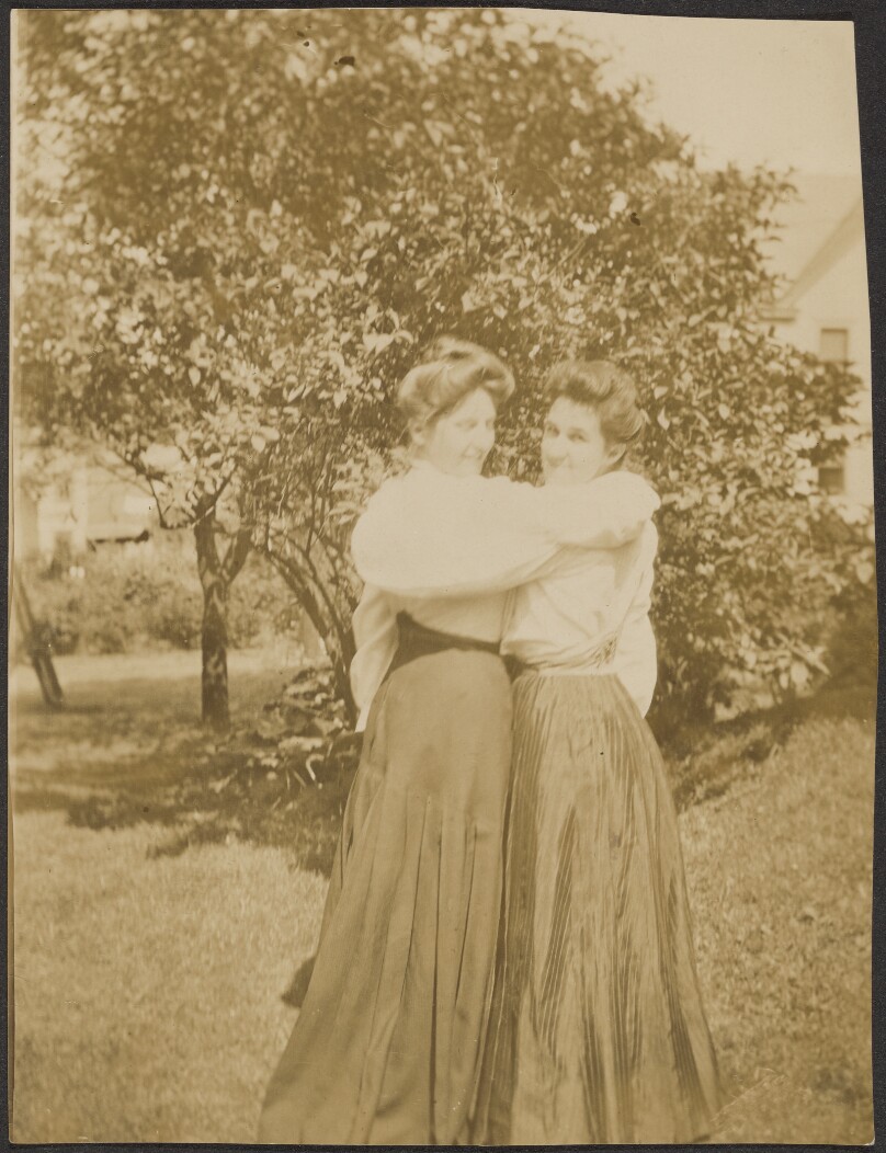 [Two women hugging]