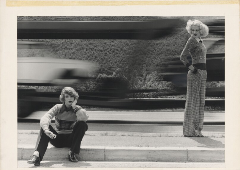 Two Models Waiting on Side Walk