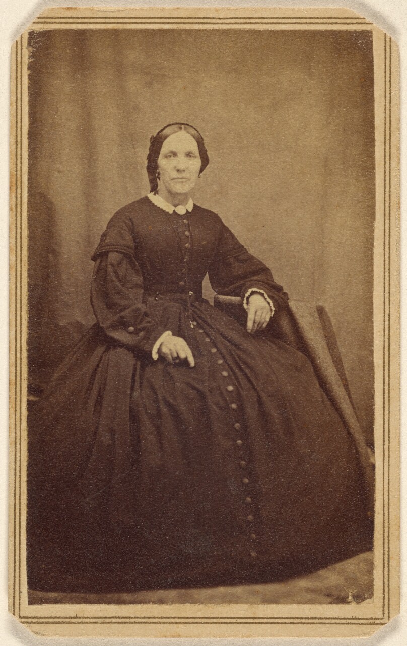 [Unidentified woman, seated]