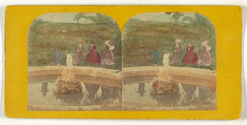 [Group of people around a fountain]