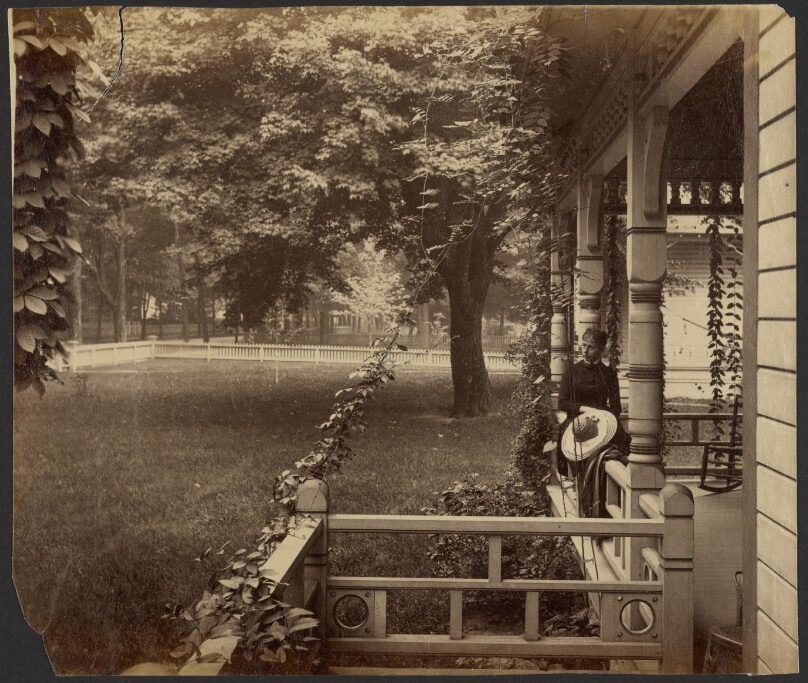 [Young woman on porch railing, Maple City]