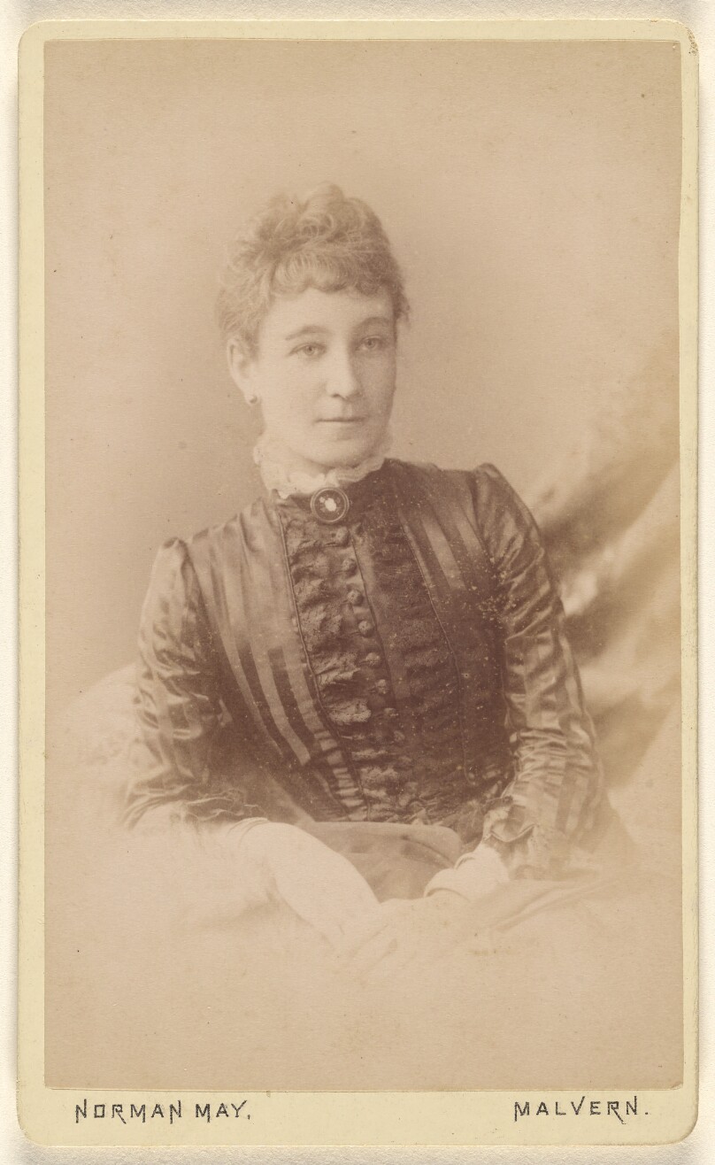 [Unidentified woman, seated]