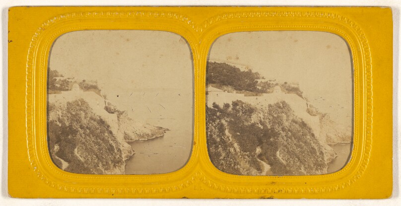 [Cliff and body of water]