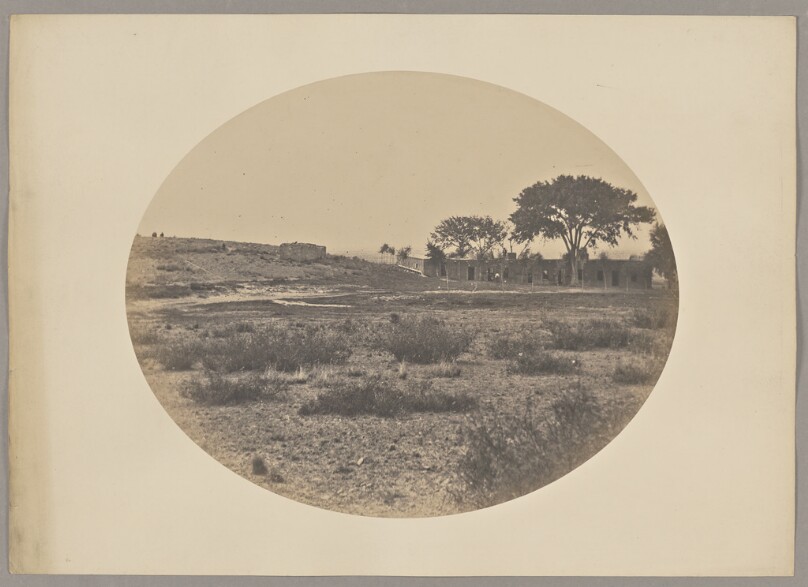 [Landscape with row of buildings]