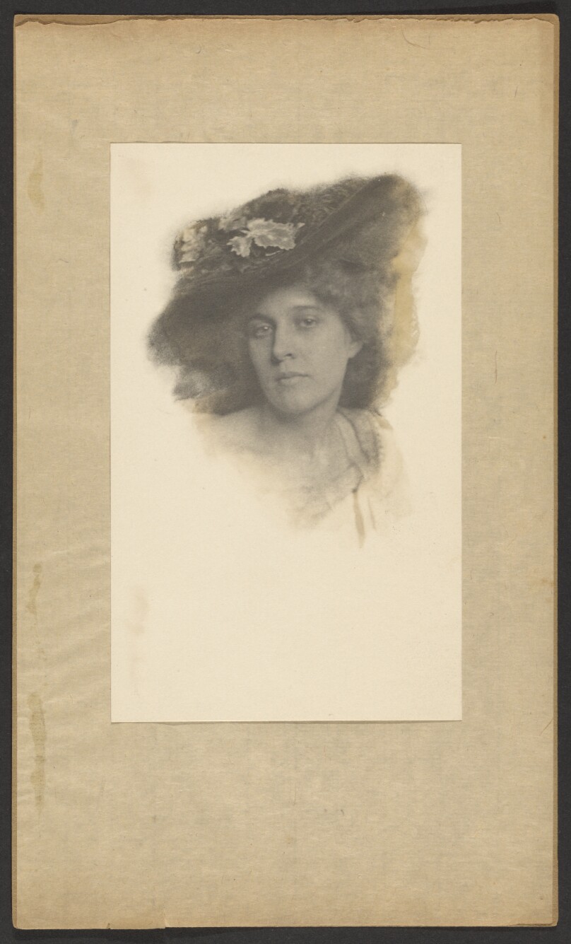 [Woman with large hat]