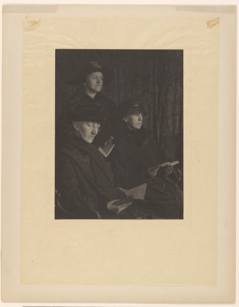 [Three Women in Hats and Coats Holding Prayer Books, possibly Blair Niles and Two Other Women in a Stage Production]