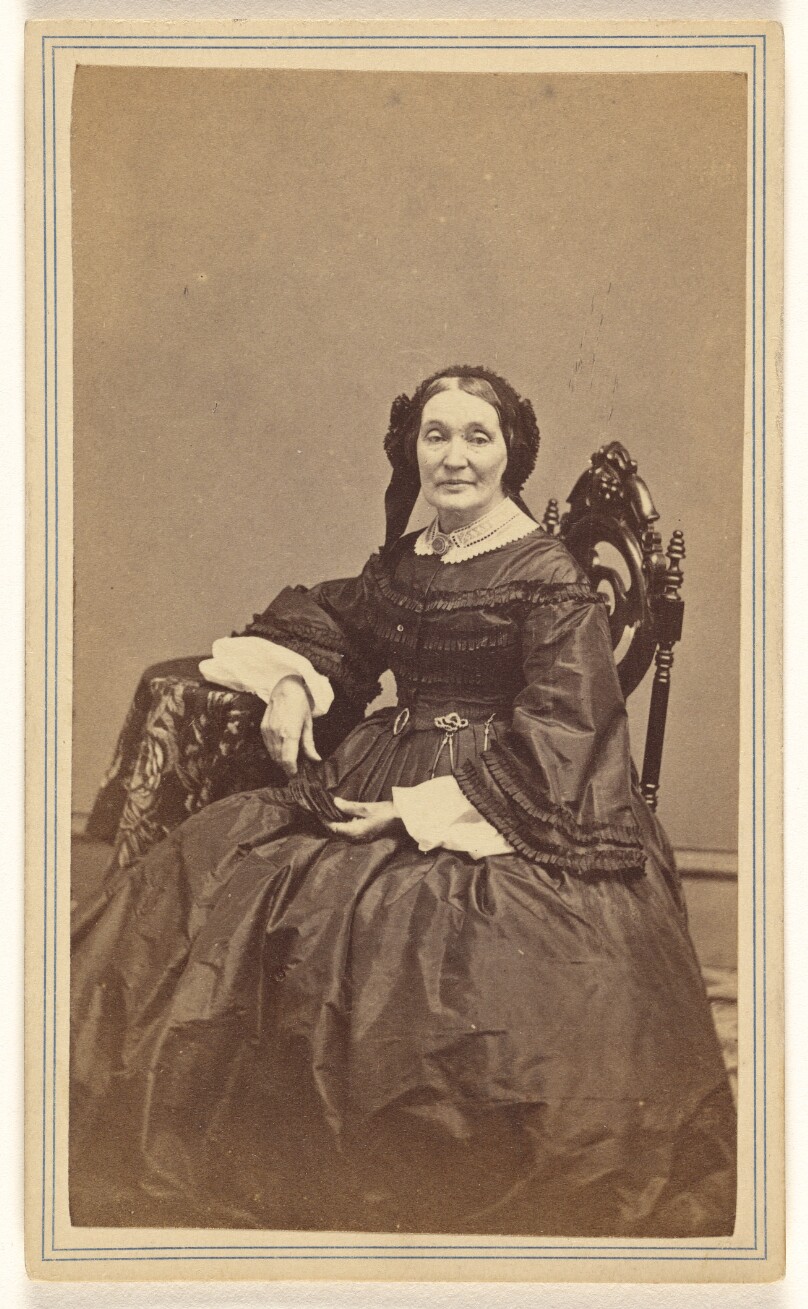 [Unidentified woman, seated]