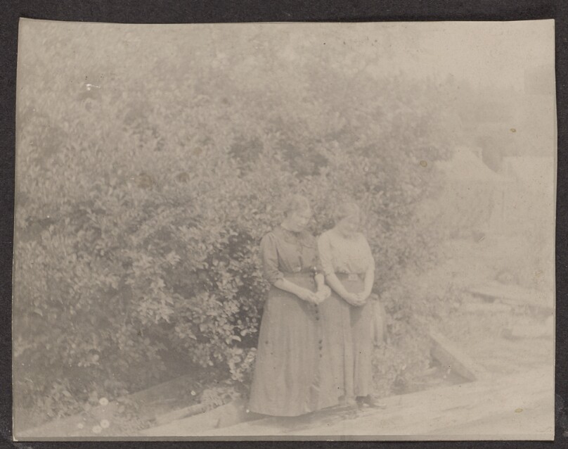 [Two women posing]
