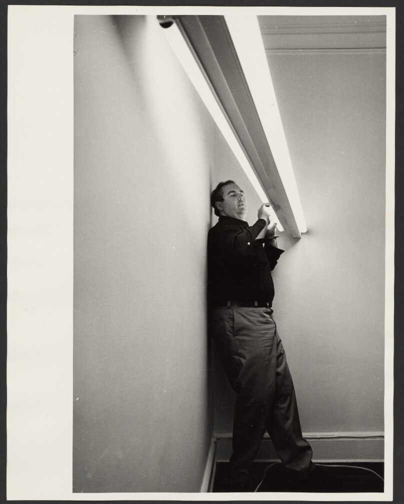 Dan Flavin installing an exhibition, Leo Castelli Gallery, New York