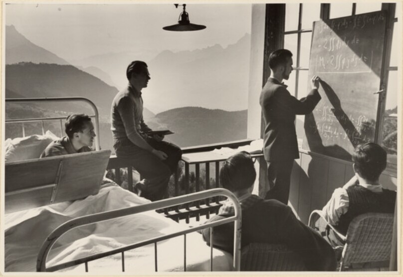 [Group of men at math lecture]