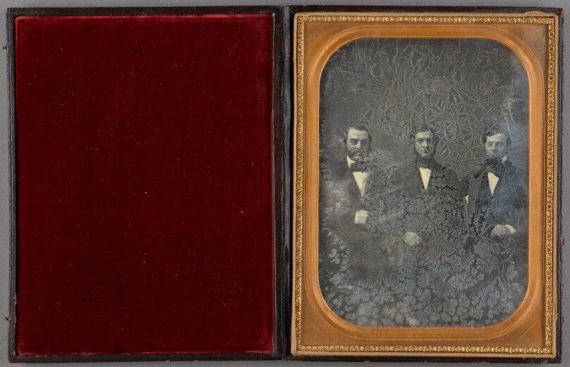 [Portrait of Three Seated Men]