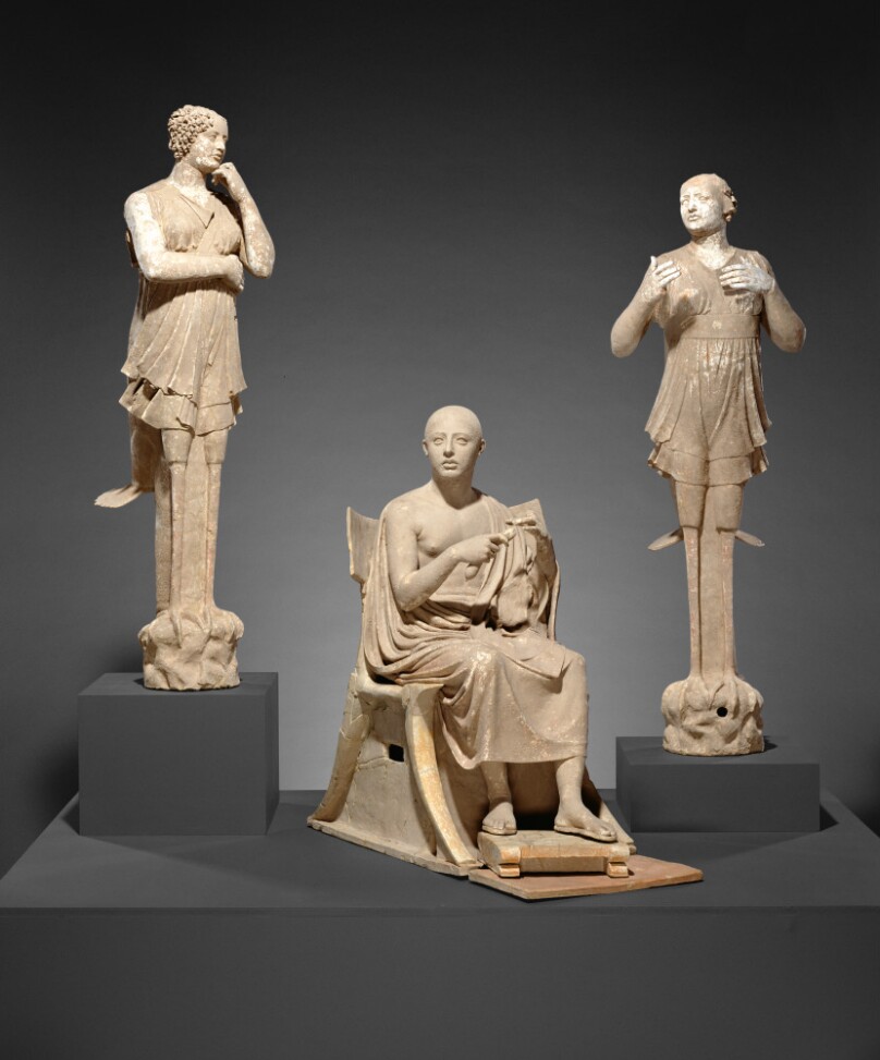 Sculptural Group of a Seated Poet and Sirens (2) with unjoined fragmentary curls (304) and shells (2)
