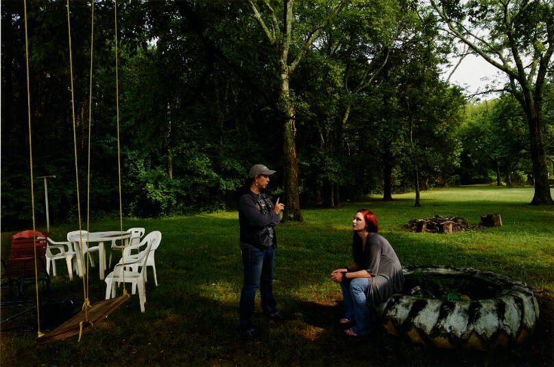 Sarah and a member of B.A.C.A. discussing a strategy to protect the boys