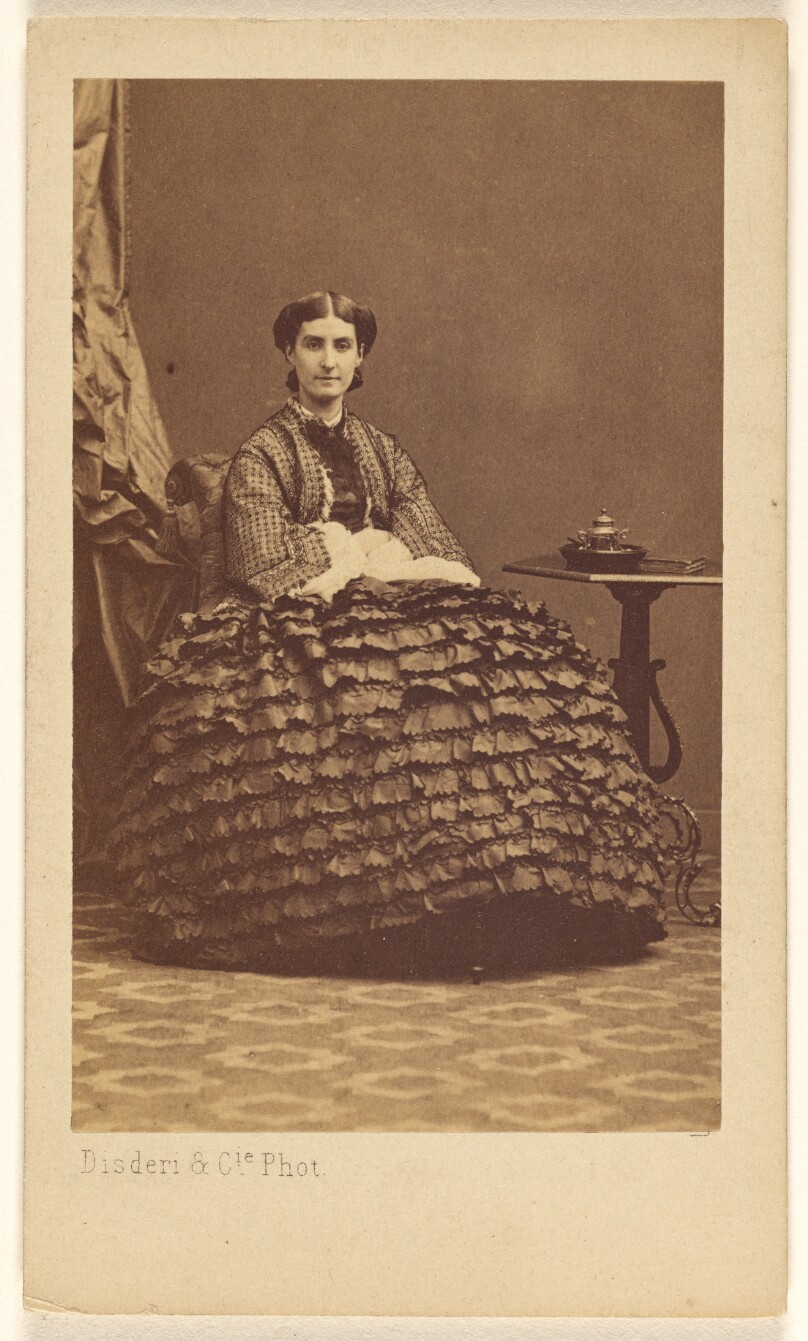 [Unidentified woman, seated]