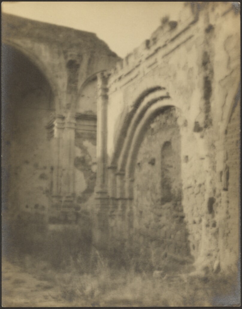 [Partially ruined stone walls]
